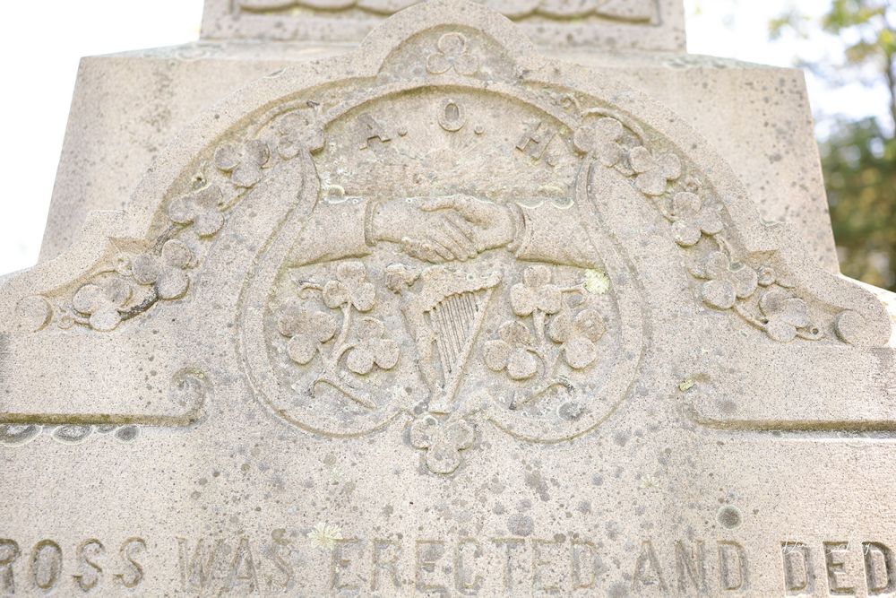 Carving on Celtic Cross representing Ancient Order of Hibernians (AOH)