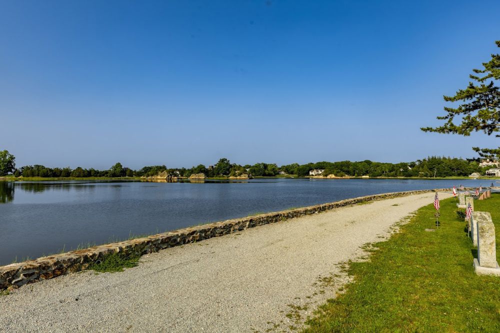 A view of the seawall on a calm weather day