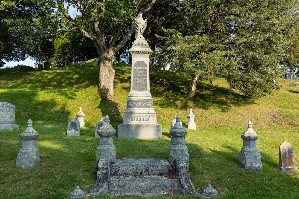 A frontal view of Nichols' gravestone.