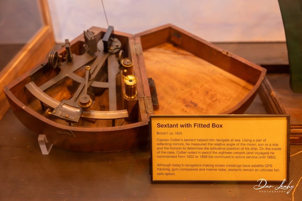 Captain Collier's sextant that helped him navigate the sea. Today's navigatators use GPS.