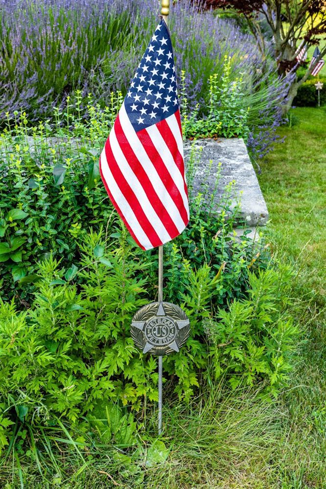 American flags decorate all Cohasset veterans gravesites