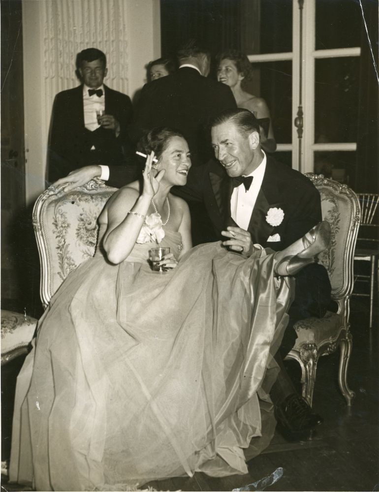 Jesse Bancroft Cox with William (Bill) Cox at a party with cigarettes and cocktails.