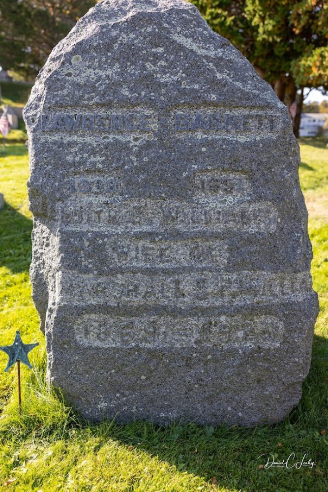 Lawrence Barrett headstone after removal of lichen and age.