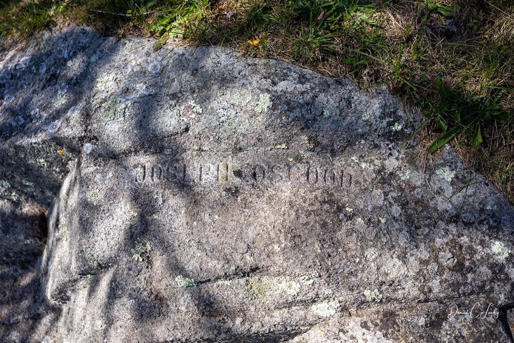 Joseph Osgood carved into plot boulder